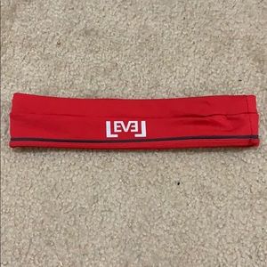 Level flipbelt in red size SMALL.